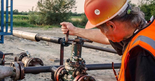 A man working in an oil field